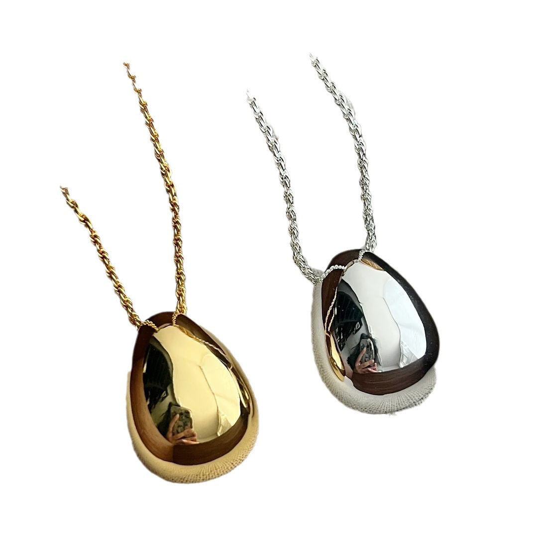 French Retro European And American Niche Design Egg-shaped Water Drop Pendant Necklace Minimalist Advanced Cold Style Silver Egg Sweater Chain Hers Haven